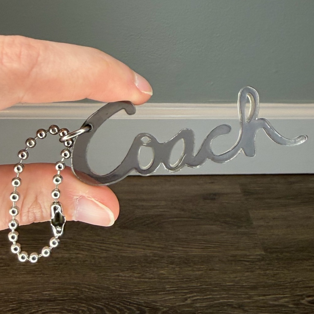 Coach Poppy Script Charm